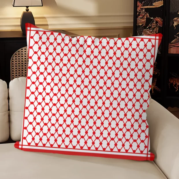 Housse de coussin rouge et écru à treillis diagonal ponctué de nœuds circulaires