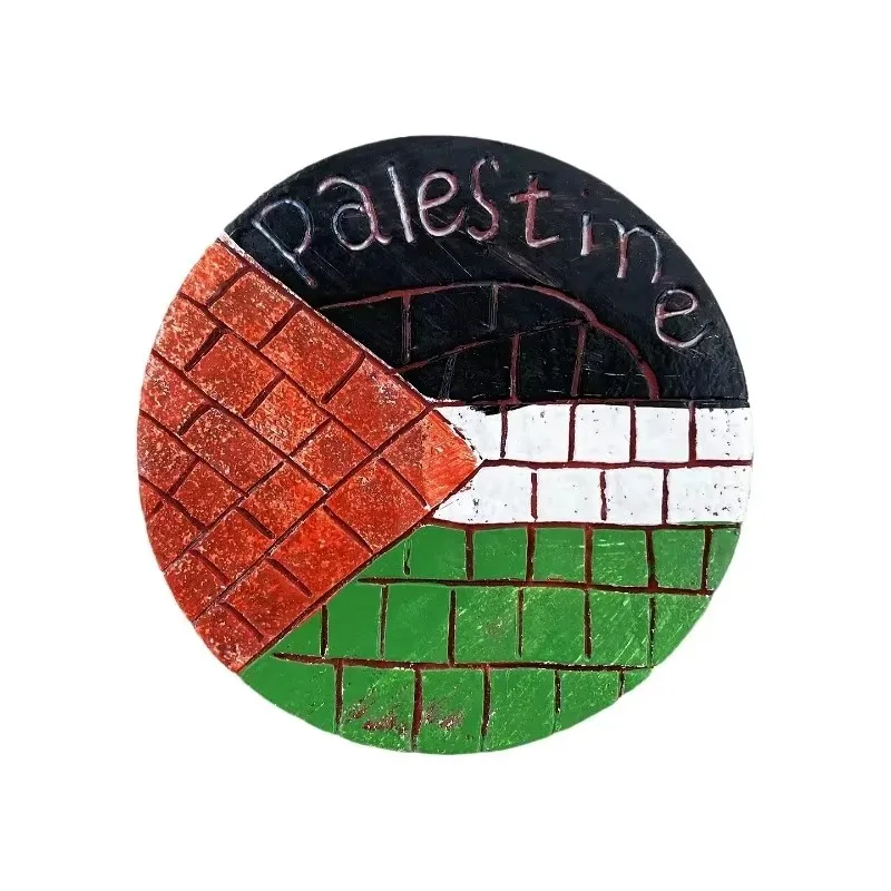 Magnet rond texturé aux couleurs du drapeau palestinien, avec inscription Palestine